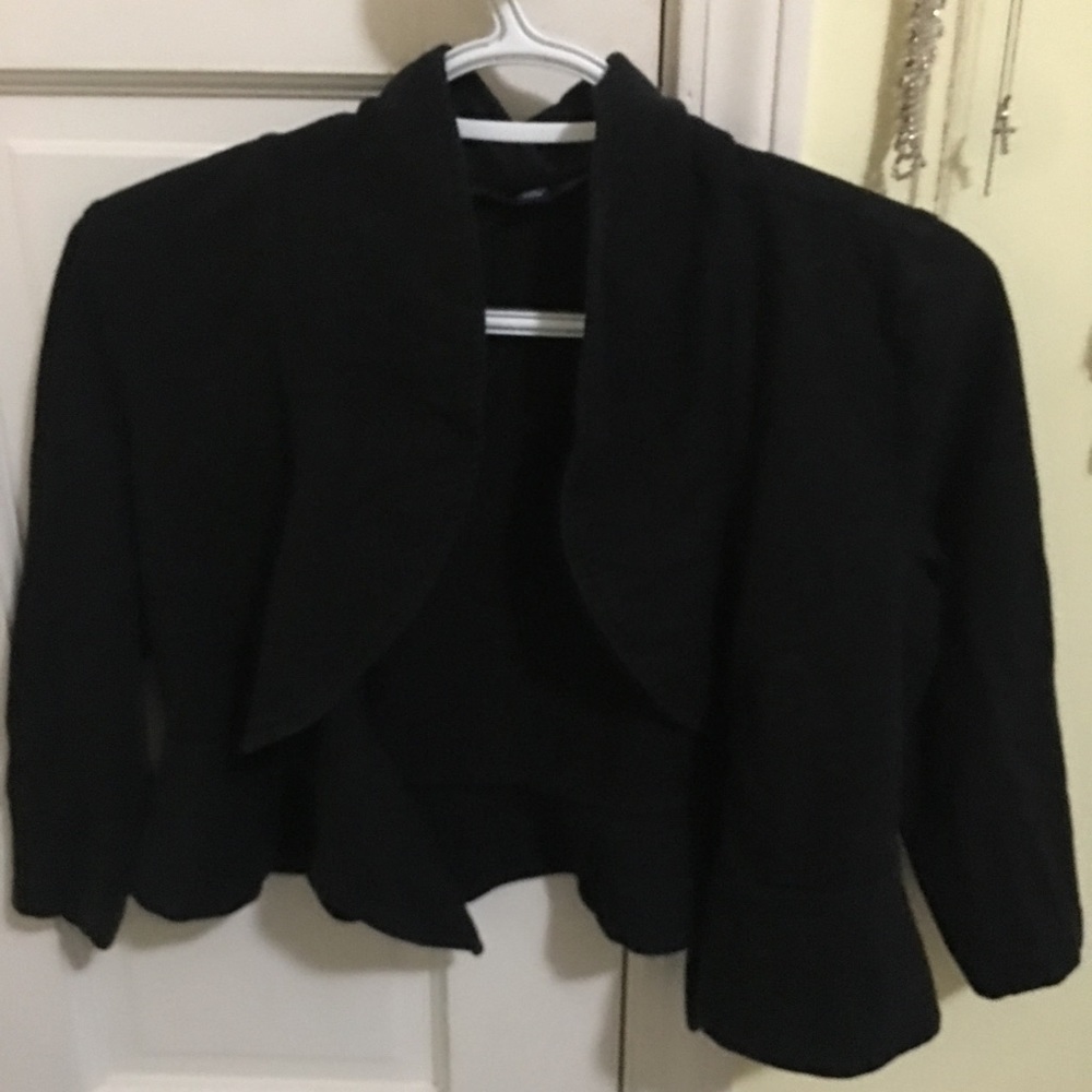 Soft black 3/4 sleeve cardigan.
